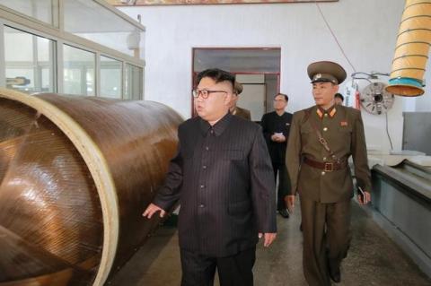 North Korean leader Kim Jong-Un looks on during a visit to the Chemical Material Institute of the Academy of Defense Science in this undated photo released by North Korea's Korean Central News Agency (KCNA) in Pyongyang on August 23, 2017. PHOTO BY REUTERS/KCNA