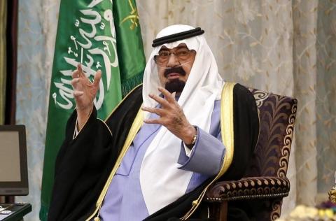 Saudi Arabia's King Abdullah talks during a meeting with U.S. President Barack Obama at Rawdat al-Khraim (Desert Camp) near Riyadh