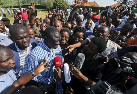 Longtime opposition leader Kizza Besigye addresses members of the media after casting his vote in the presidential election at Rwakabengo polling station in Rukungiri a small town west of capital Kampala, February 18, 2016. PHOTO BY REUTERS/Edward Echwalu