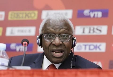 Outgoing President of International Association of Athletics Federations (IAAF) Lamine Diack answers a question at a news conference in Beijing, August 20, 2015. PHOTO BY REUTERS/Jason Lee