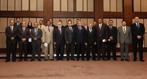 Libya's new Prime Minister Ahmed Maiteeq (6th L), President of the General National Congress Nouri Abusshmin (7th L) and other members of the new Libyan government pose for a group photo in Tripoli