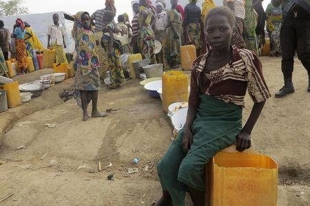 A girl waits in line for water at the Minawao refugee camp, northern Cameroon, February 18, 2015. PHOTO BY REUTERS/Bate Felix Tabi Tabe