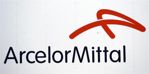 A logo of ArcelorMittal steel group is seen at the Les Chantiers de l'Atlantique shipyards in Saint Nazaire, western France