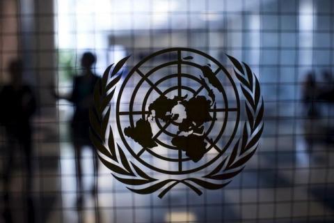 A United Nations logo is seen on a glass door in the Assembly Building at the United Nations headquarters in New York City, September 18, 2015. PHOTO BY REUTERS/Mike Segar