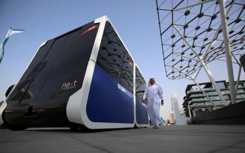 A man walks past the world's first autonomous pods which was launched by the Roads and Transport Authority of Dubai in Dubai, United Arab Emirates, February, 28, 2018. PHOTO BY REUTERS/Satish Kumar