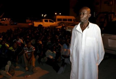 A man detained by a Libyan anti-illegal immigrants unit during an early morning raid on migrants, for smuggling, is pictured at a temporary detention centre, in Tripoli, October 13, 2015. PHOTO BY REUTERS/Hani Amara