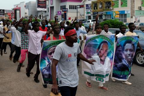 Members of the Islamic Movement of Nigeria gesture during a march to demand the release of their Nigerian Shi'ite leader Ibrahim Zakzaky, along a street in Abuja, Nigeria, October 31, 2018. PHOTO BY REUTERS/Paul Carsten