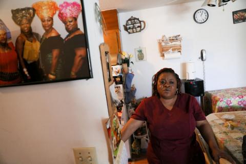 Deferred Enforced Departure (DED) status holder Marie Zar prepares for work the day after U.S. President Donald Trump granted a one-year extension of her immigration status, in Brooklyn Center, Minnesota, U.S., March 29, 2019. PHOTO BY REUTERS/Jonathan Ernst