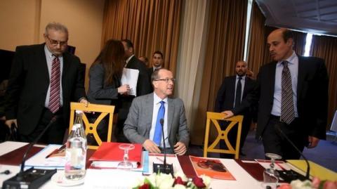 United Nations Special Representative and head of the U.N. Support Mission in Libya Martin Kobler (C) attends a meeting with Libya's two rival governments in Tunis, Tunisia, December 10, 2015. PHOTO BY REUTERS/Zoubeir Souissi