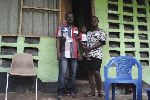 Marvin Kai, an Ebola survivor, poses for a picture with his wife Odell Kai and their one-year-old son in Monrovia, October 18, 2014. PHOTO BY REUTERS/James Giahyue