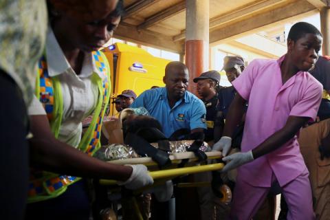 Medics transport an injured person at a hospital after a building containing a school collapsed in Nigeria's commercial capital of Lagos, Nigeria, March 13, 2019. PHOTO BY REUTERS/Afolabi Sotunde