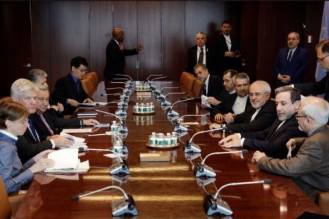 Iran's Foreign Minister Mohammad Javad Zarif (3rd R) sits at a table with United Nations Secretary-General Antonio Guterres (3rd L) at the U.N. headquarters in New York City, U.S., July 17, 2017. PHOTO BY REUTERS/Lucas Jackson