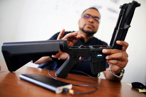 (Reuters) - A carbine that can call in an airstrike. A computer-aided scope on a machine gun that can turn just about anyone into a marksman.Even firearms that measure and record every movement, from the angle of the barrel to the precise moment of each shot fired, which could provide law enforcement with a digital record of police shootings.  The application of information technology to firearms has long been resisted in the United States by gun owners and law-enforcement officials who worry they could be 