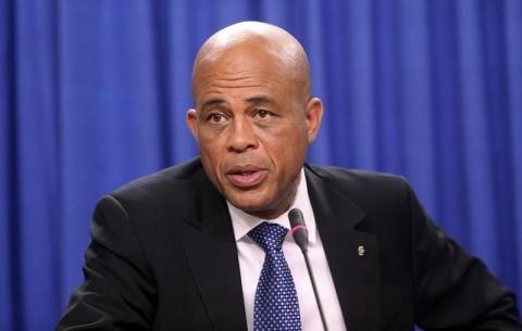 Haitian President Michel Martelly addresses a media conference at the Diplomatic Centre in St Ann's, on the outskirts of the capital Port-of-Spain, November 26, 2013. PHOTO BY REUTERS/Andrea De Silva