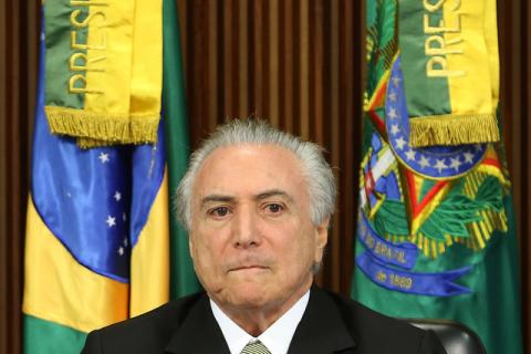 Brazil's interim President Michel Temer reacts during a meeting of the presentation of economic measures, at the Planalto Palace in Brasilia, Brazil, May 24, 2016. PHOTO BY REUTERS/Adriano Machado