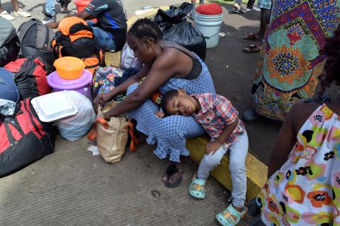 Migrants from Cameroon rest while waiting with other migrants from Africa and Haiti to enter the Siglo XXI immigrant detention center to request humanitarian visas, issued by the Mexican government, to cross the country towards the United States, in Tapachula, Mexico, June 27, 2019. PHOTO BY REUTERS/Jose Torres