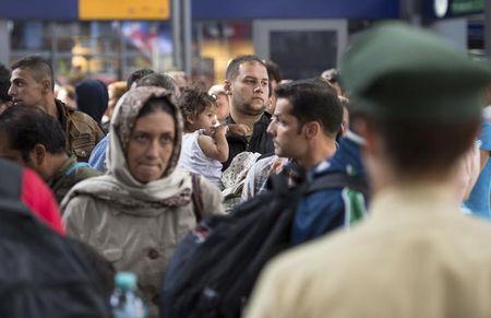 Migrants arrive to the main railway station in Munich, Germany, September 1, 2015. PHOTO BY REUTERS/Lukas Barth