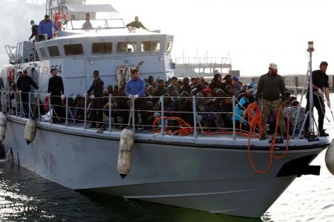 A Libyan Navy boat with migrants on board arrives at navy base in Tripoli, Libya, April 22, 2018. PHOTO BY REUTERS/Ismail Zitouny