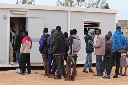 A group of Senegalese illegal immigrants, who according to authorities will be deported back to Senegal through the border with Tunisia, are held at the Alkarareem immigration centre in the east of Misrata, February 26, 2015. PHOTO BY REUTERS/Stringer