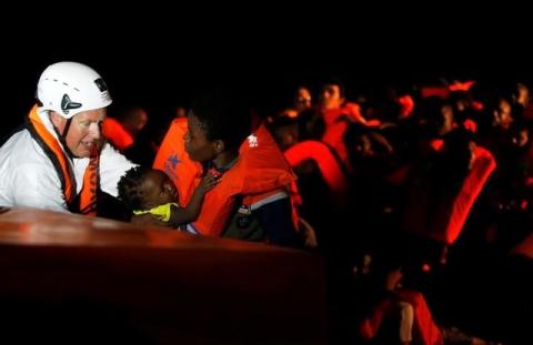 Migrants are seen during rescue operation in the Mediterranea Sea October 20, 2016. PHOTO BY REUTERS/Yara Nardi/Italian Red Cross press office