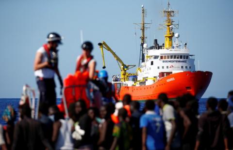 The MV Aquarius rescue ship is seen as migrants on are rescued by the SOS Mediterranee organisation during a search and rescue (SAR) operation in the Mediterranean Sea, off the Libyan Coast, September 14, 2017. PHOTO BY REUTERS/Tony Gentile