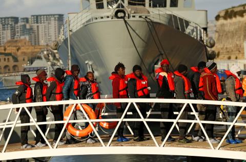 Migrants who were stranded on the NGO migrant rescue ships Sea-Watch 3 and Professor Albrecht Penck disembark from an Armed Forces of Malta patrol boat at its base in Marsamxett Harbour, Valletta, Malta January 9, 2019. PHOTO BY REUTERS/Darrin Zammit Lupi