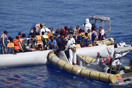 Migrants are rescued by the Italian Navy in the Mediterranean Sea in this September 2, 2015 handout courtesy of the Italian Navy. PHOTO BY REUTERS/Italian Navy