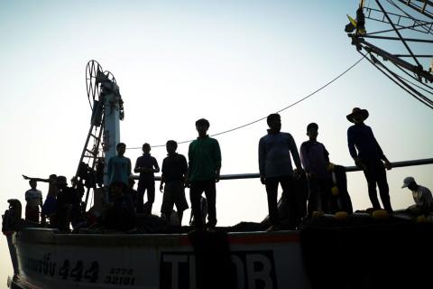 Migrant workers prepare to unload their catch at a port in Samut Sakhon province, Thailand, January 22, 2018. PHOTO BY REUTERS/Athit Perawongmetha