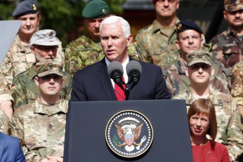 U.S. Vice President Mike Pence delivers a speech next to Estonia's President Kersti Kaljulaid as they visit NATO's Enhanced Forward Presence mission and Estonian troops in Tallinn, Estonia, July 31, 2017. PHOTO BY REUTERS/Ints Kalnins