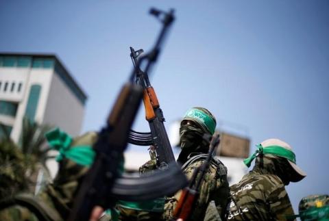 Palestinian Hamas militants take part in a protest in Gaza City, July 21, 2017. PHOTO BY REUTERS/Mohammed Salem