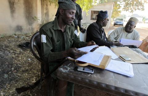 Militia hunters helping the army to fight the Boko Haram insurgence hold a meeting in Yola, Adamawa State, January 14, 2015. PHOTO BY REUTERS/Afolabi Sotunde