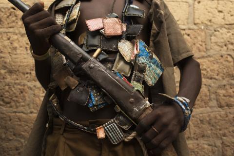 An anti-balaka militiaman poses for a photograph on the outskirts of the capital of the Central African Republic Bangui