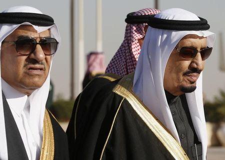 Saudi Arabia's Deputy Crown Prince Mohammed bin Nayef (L) arrives with his uncle King Salman (R) to greet U.S. President Barack Obama at King Khalid International Airport in Riyadh, January 27, 2015. PHOTO BY REUTERS/Jim Bourg