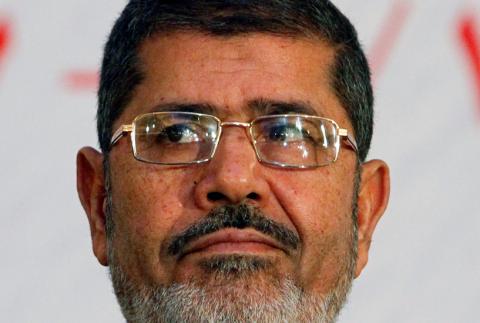 Mohamed Mursi attends the Organisation of Islamic Cooperation (OIC) summit in Cairo. PHOTO BY REUTERS/Asmaa Waguih