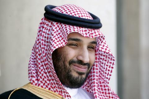 Saudi Arabia's Crown Prince Mohammed bin Salman uses his phone during a meeting with Japan's Prime Minister Shinzo Abe in Riyadh, Saudi Arabia, January 12, 2020. PHOTO BY REUTERS/Bandar Algaloud/Courtesy of Saudi Royal Court