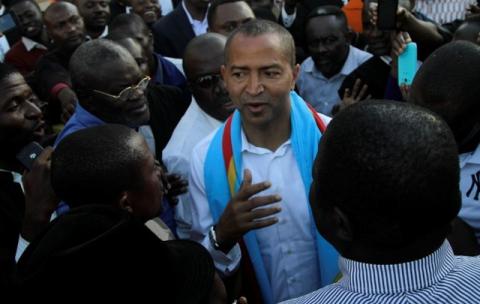 Democratic Republic of Congo's opposition presidential candidate Moise Katumbi is escorted by his supporters as he leaves the prosecutor's office in Lubumbashi, the capital of Katanga province of the Democratic Republic of Congo, May 11, 2016. PHOTO BY REUTERS/Kenny Katombe