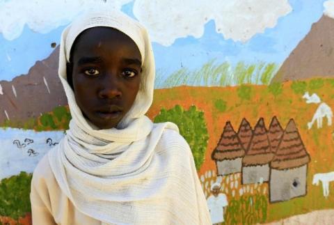 Mozdalifa Abaker Omer, a 5th grader at the Alsalam 2 School for Girls at Aboshok camps for the internally displaced persons poses for a photograph in El-Fasher, North Darfur, Sudan, November 17, 2015. PHOTO BY REUTERS/Mohamed Nureldin Abdallah