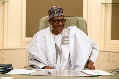 Nigeria's President Muhammadu Buhari smiles as he resumes work following seven weeks of medical leave, in Abuja, Nigeria, March 13, 2017. PHOTO BY REUTERS/Stringer