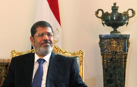 Egypt' Mohamed Mursi attends a meeting with Tunisia's President Moncef Marzouki (not pictured) at the presidential palace in Cairo. PHOTO BY REUTERS/Amr Abdallah Dalsh