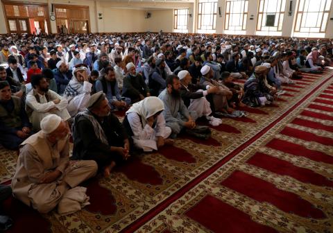 KABUL (Reuters) - Muslims around the world celebrated the Eid-al-Fitr religious holiday on Tuesday, marking the end of Islam’s holy month of Ramadan.  Like the start of Ramadan, during which believers abstain from eating and drinking during daylight hours, Eid-al-Fitr depends on the sighting of the moon and its celebration varies in different countries. The day begins with early morning prayers and then family visits and feasts.  In the Afghan capital Kabul, families celebrated with a stroll in a central pa