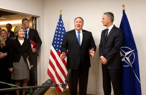 U.S. Secretary of State Mike Pompeo and NATO Secretary General Jens Stoltenberg attend a NATO foreign ministers meeting at the Alliance's headquarters in Brussels, Belgium, April 27, 2018. PHOT BY REUTERS/ Virginia Mayo