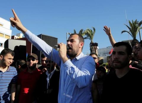 Moroccan activist and the leader of the protest movement Nasser Zefzafi gives a speech during a demonstration in the northern town of Al-Hoceima, seven months after a fishmonger was crushed to death inside a garbage truck as he tried to retrieve fish confiscated by the police, in Al-Hoceima, Morocco, May 18, 2017. PHOTO BY REUTERS/Youssef Boudlal