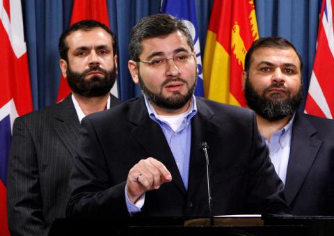 Abdullah Almalki (C), with Muayyed Nureddin (L) and Ahmad El Maati, speaks during a news conference on Parliament Hill in Ottawa, October 12, 2007. PHOTO BY REUTERS/Chris Wattie