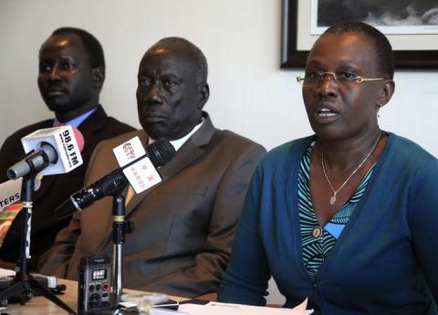 (R-L) Angeline Teny, wife of South Sudan's rebel leader Riek Machar, speaks beside General Alfred Lado Gore and Brigadier General Lul Ruai Koang, military spokesman for Sudan's People Liberation Movement (SPLM) rebel, during a news conference in Ethiopia's capital of Addis Ababa, February 26, 2014. PHOTO BY REUTERS/Tiksa Negeri