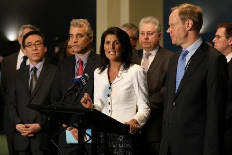 U.S. ambassador to the United Nations Nikki Haley speaks while French Deputy Ambassador to the U.N. Alexis Lamek and British Ambassador to the United Nations Matthew Rycroft listen outside the General Assembly at the United Nations in New York. PHOTO BY REUTERS/Shannon Stapleton