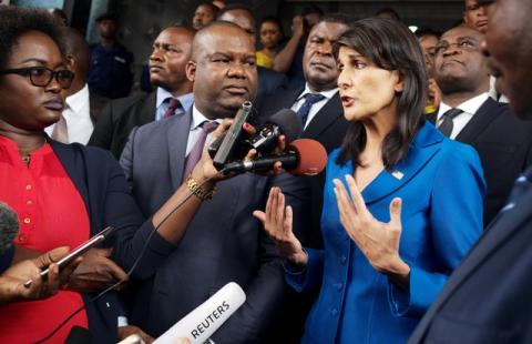 U.S. Ambassador to the United Nations Nikki Haley and President of Congo's electoral commission (CENI) Corneille Nangaa (C) addresses the media at the CENI headquarters in Gombe, Kinshasa, Democratic Republic of Congo, October 27, 2017. REUTERS/Robert Carrubba