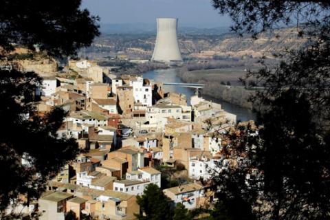 A view of Asco village and a nuclear plant, which uses the waters of the Ebro river water to cool it, in Asco near Tarragona, January 27, 2010. PHOTO BY REUTERS/Gustau Nacarino