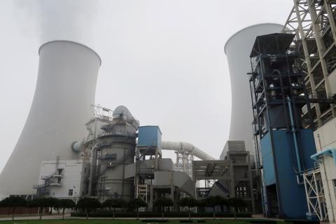 Smoke is seen from a cooling tower of a China Energy ultra-low emission coal-fired power plant in Sanhe, Hebei province, China, July 18, 2019. PHOTO BY REUTERS/Shivani Singh