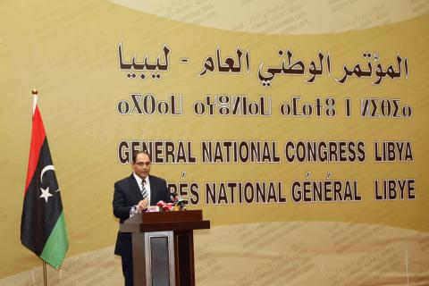 Nuri al-Abbar, head of the High National Elections Commission, speaks during a ceremony in Tripoli