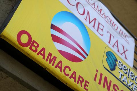 A sign on an insurance store advertises Obamacare in San Ysidro, San Diego, California, U.S., October 26, 2017. PHOTO BY REUTERS/Mike Blake